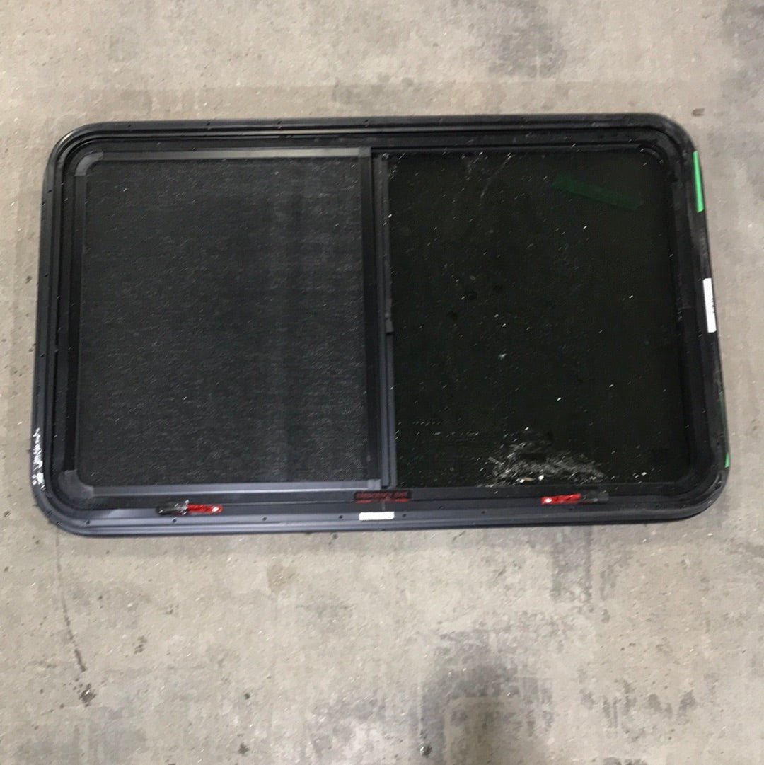 Used Black Radius Emergency Opening Window : 41 1/2" W x 26" H x 1" D - Young Farts RV Parts