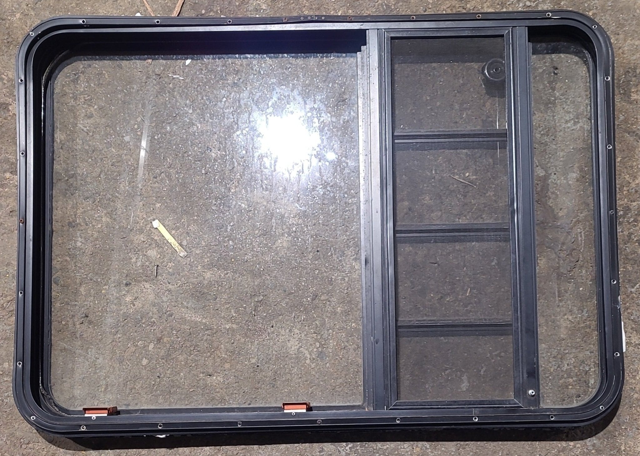 Used Black Radius Emergency Opening Window : 41 1/2" W x 28 3/4" H x 1 1/8" D - Young Farts RV Parts