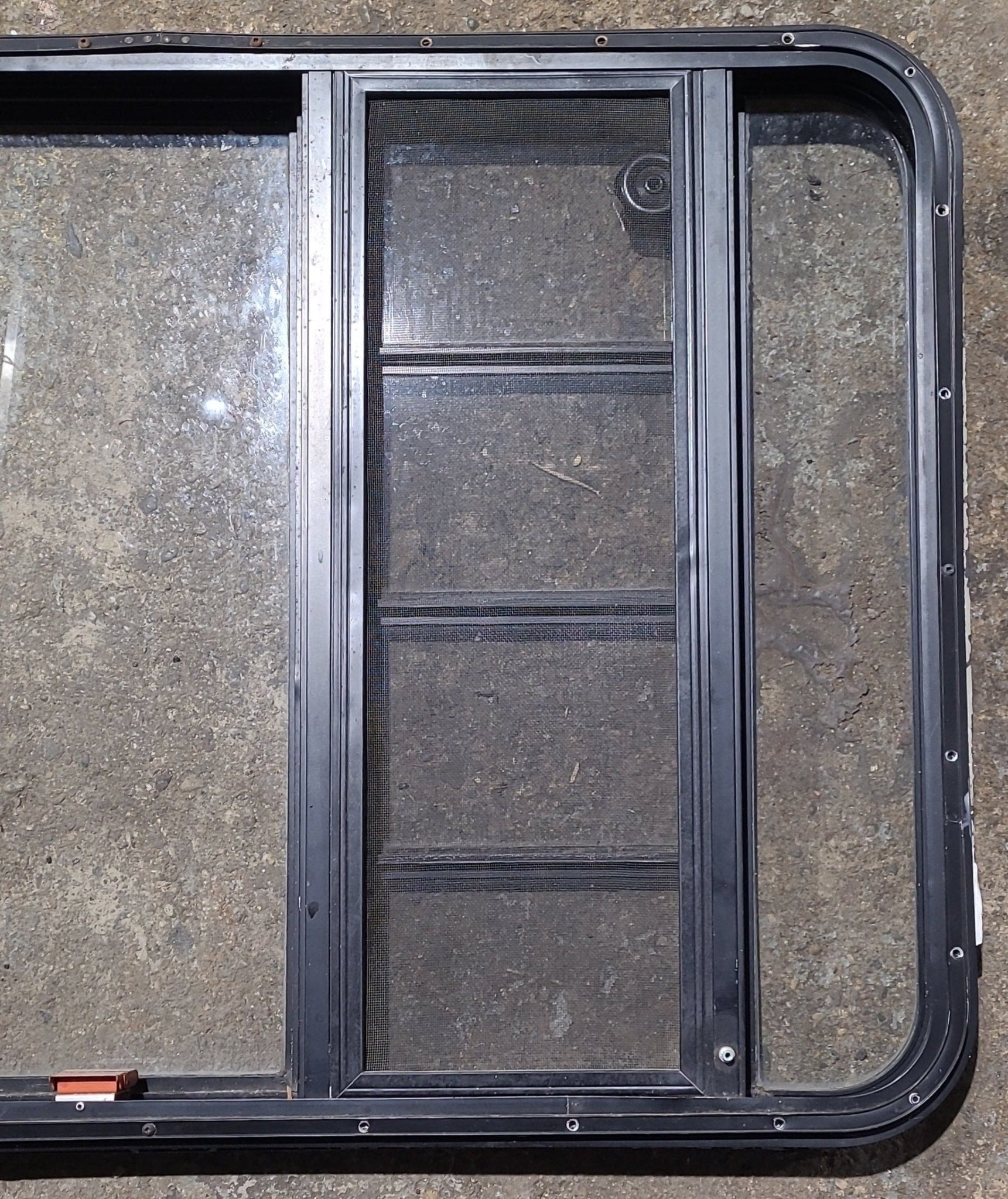 Used Black Radius Emergency Opening Window : 41 1/2" W x 28 3/4" H x 1 1/8" D - Young Farts RV Parts