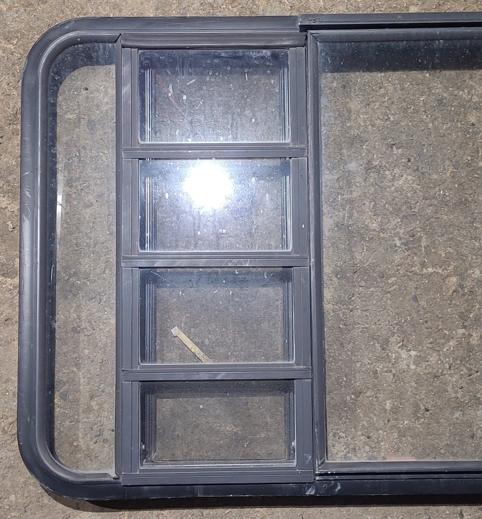 Used Black Radius Emergency Opening Window : 41 1/2" W x 28 3/4" H x 1 1/8" D - Young Farts RV Parts