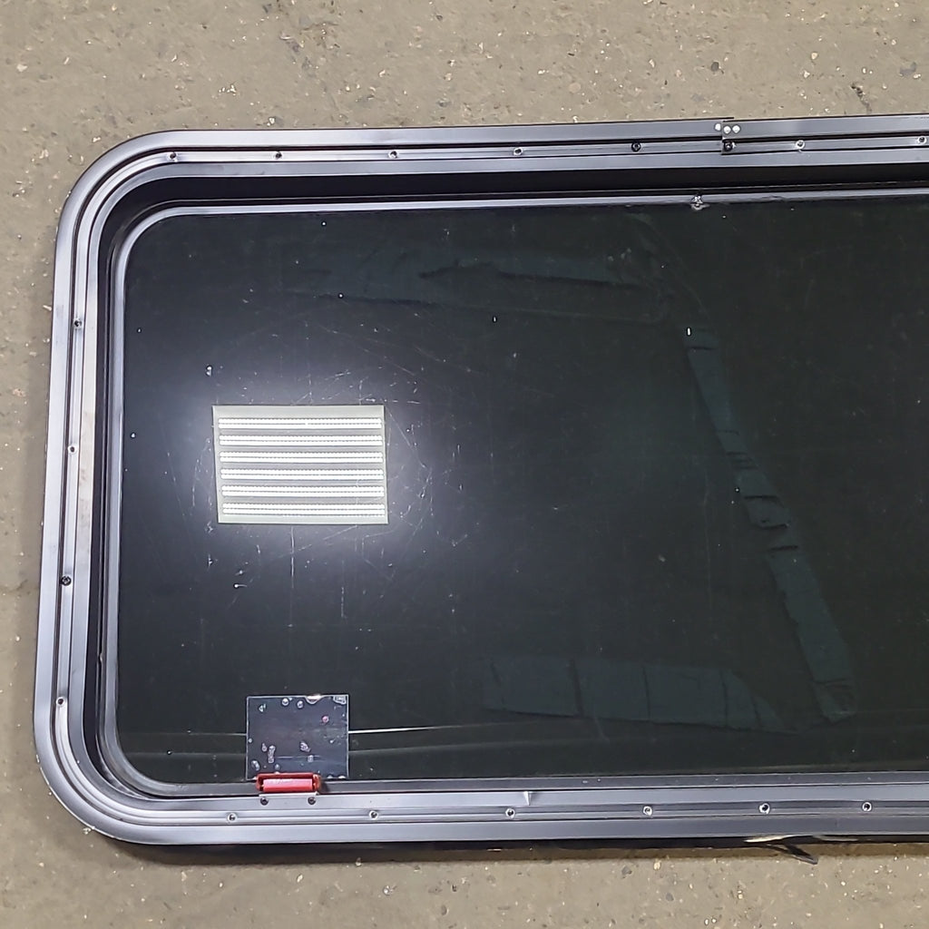 Used Black Radius Emergency Opening Window : 41 3/8" W X 21 1/4" H X 2" D - Young Farts RV Parts