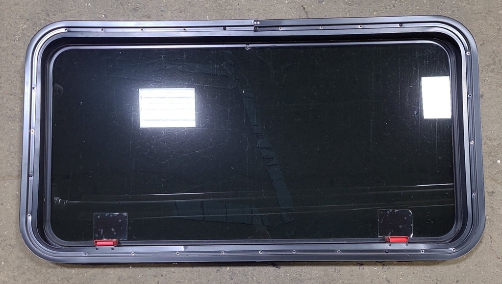 Used Black Radius Emergency Opening Window : 41 3/8" W X 21 1/4" H X 2" D - Young Farts RV Parts