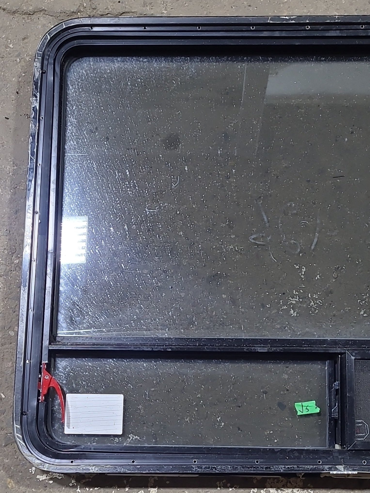 Used Black Radius Emergency Opening Window : 47 1/2" W x 35 1/4" H x 1 3/4" D - Young Farts RV Parts