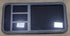 Used Black Radius Emergency Opening Window : 47 1/4" W x 22 1/2" H x 1 3/4" D - Young Farts RV Parts