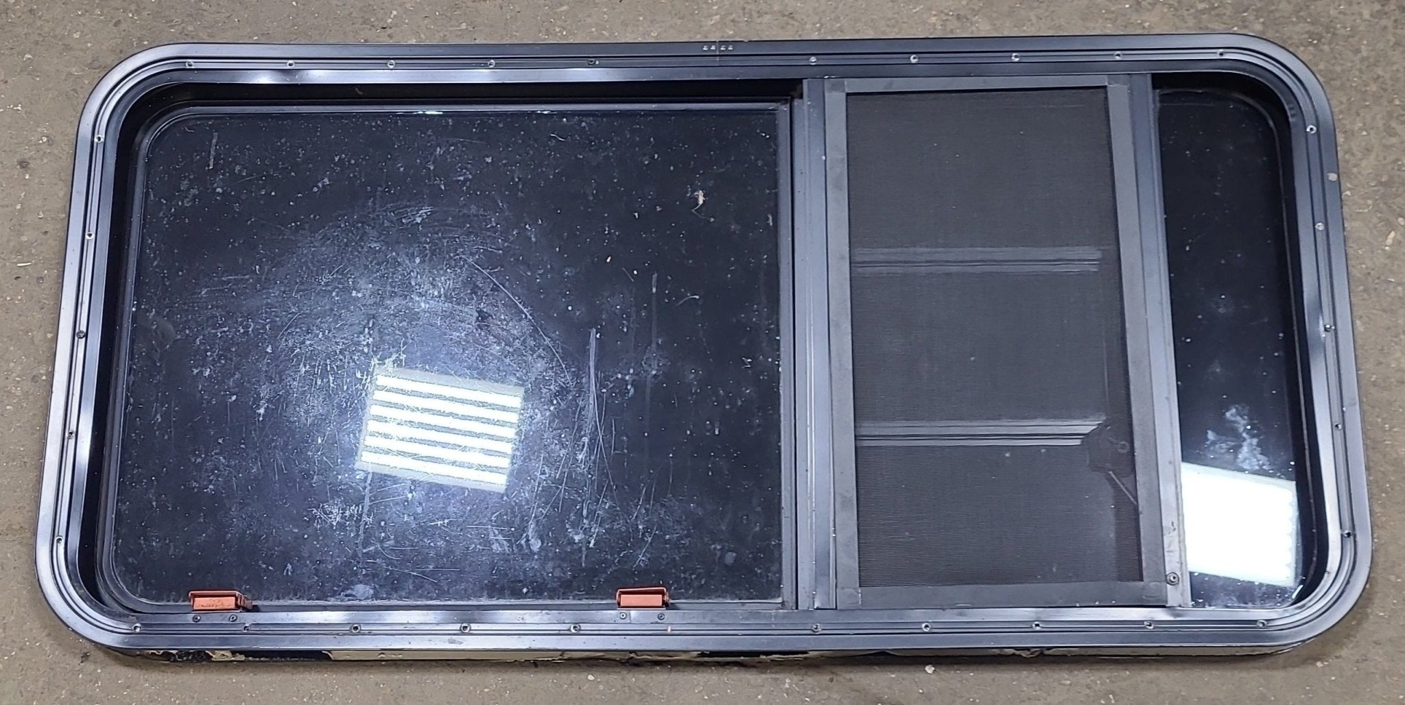 Used Black Radius Emergency Opening Window : 47 1/4" W x 22 1/2" H x 1 3/4" D - Young Farts RV Parts