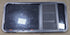 Used Black Radius Emergency Opening Window : 47 1/4" W x 22 1/2" H x 1 3/4" D - Young Farts RV Parts