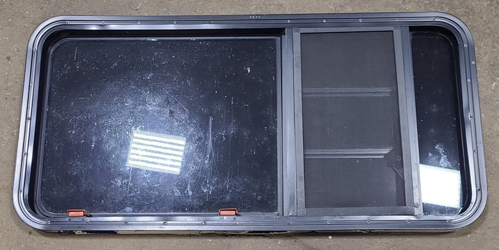 Used Black Radius Emergency Opening Window : 47 1/4" W x 22 1/2" H x 1 3/4" D - Young Farts RV Parts