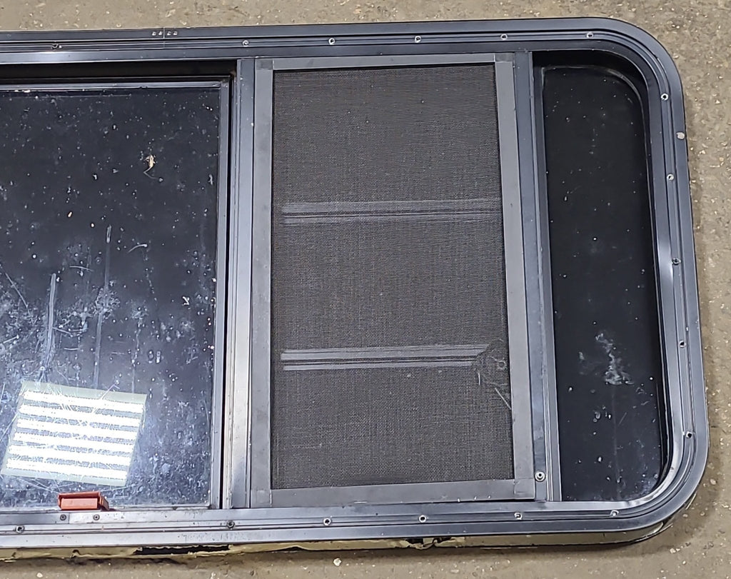 Used Black Radius Emergency Opening Window : 47 1/4" W x 22 1/2" H x 1 3/4" D - Young Farts RV Parts