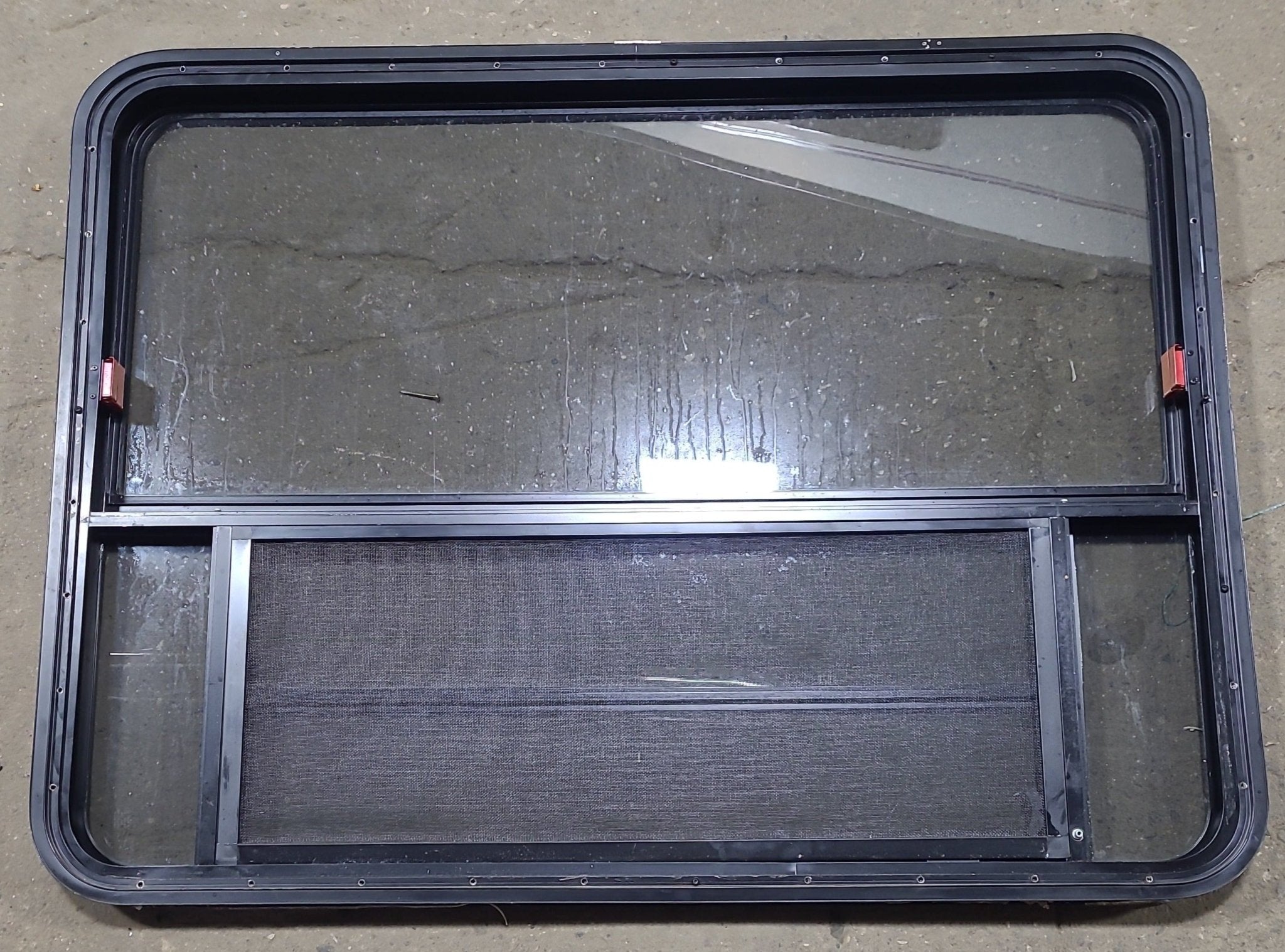 Used Black Radius Emergency Opening Window : 47 1/4" W x 35 1/2" H x 1 7/8" D - Young Farts RV Parts