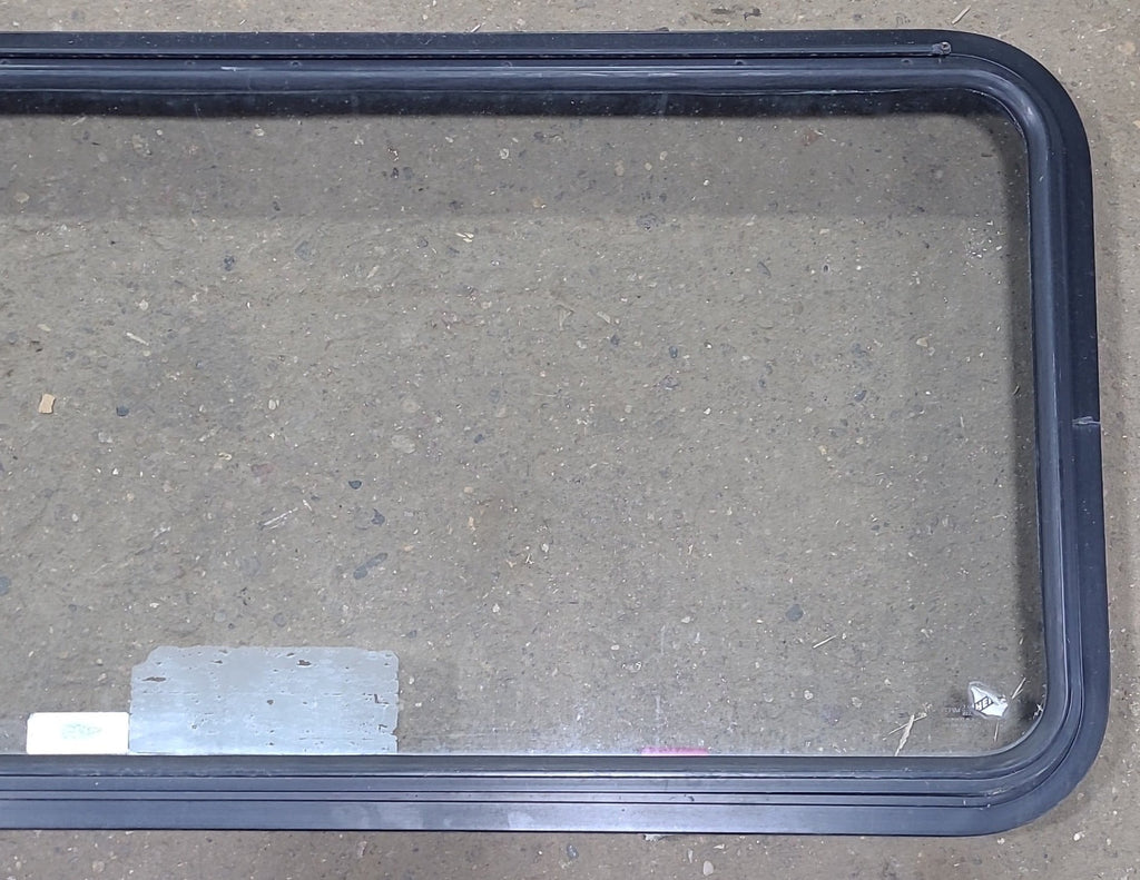 Used Black Radius Emergency Opening Window : 48 1/2" W x 21 3/4" H x 1 3/4" D - Young Farts RV Parts