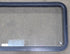 Used Black Radius Emergency Opening Window : 48 1/2" W x 21 3/4" H x 1 3/4" D - Young Farts RV Parts