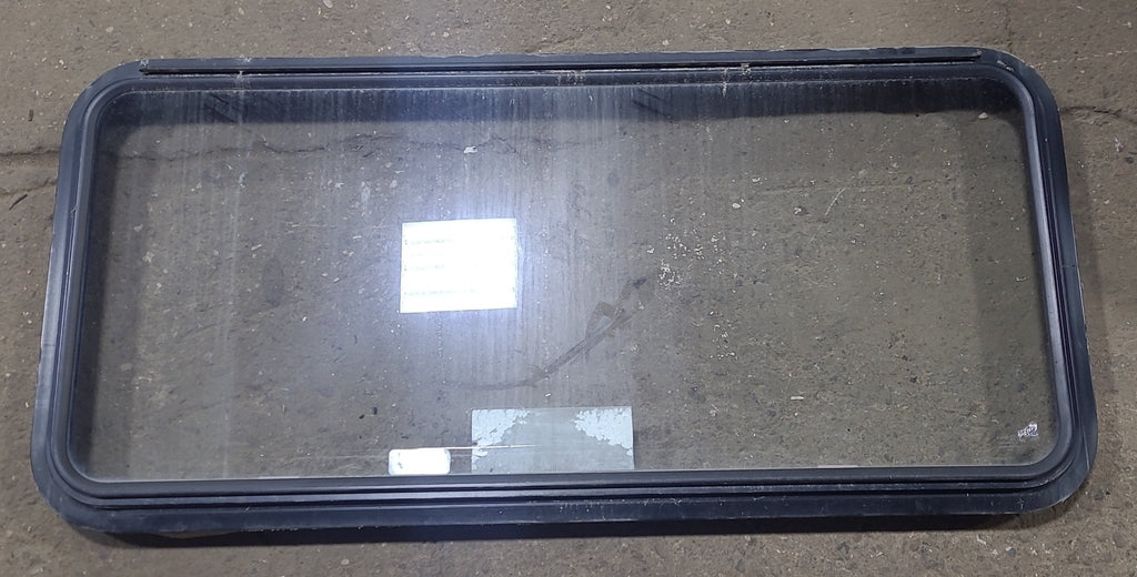 Used Black Radius Emergency Opening Window : 48 1/2" W x 22" H x 1 3/4" D - Young Farts RV Parts