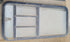 Used Black Radius Emergency Opening Window : 48 X 23 X 2" D - Young Farts RV Parts