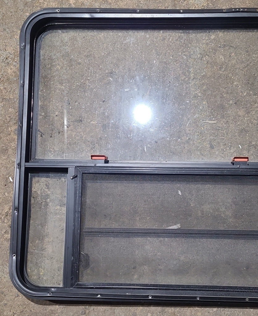 Used Black Radius Emergency Opening Window : 53 1/2" W x 34 3/4" H x 1 1/4" D - Young Farts RV Parts