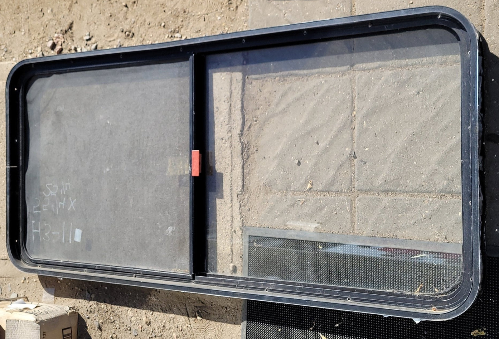 Used Black Radius Emergency Opening Window : 55 1/4 X 25 1/4 X 2