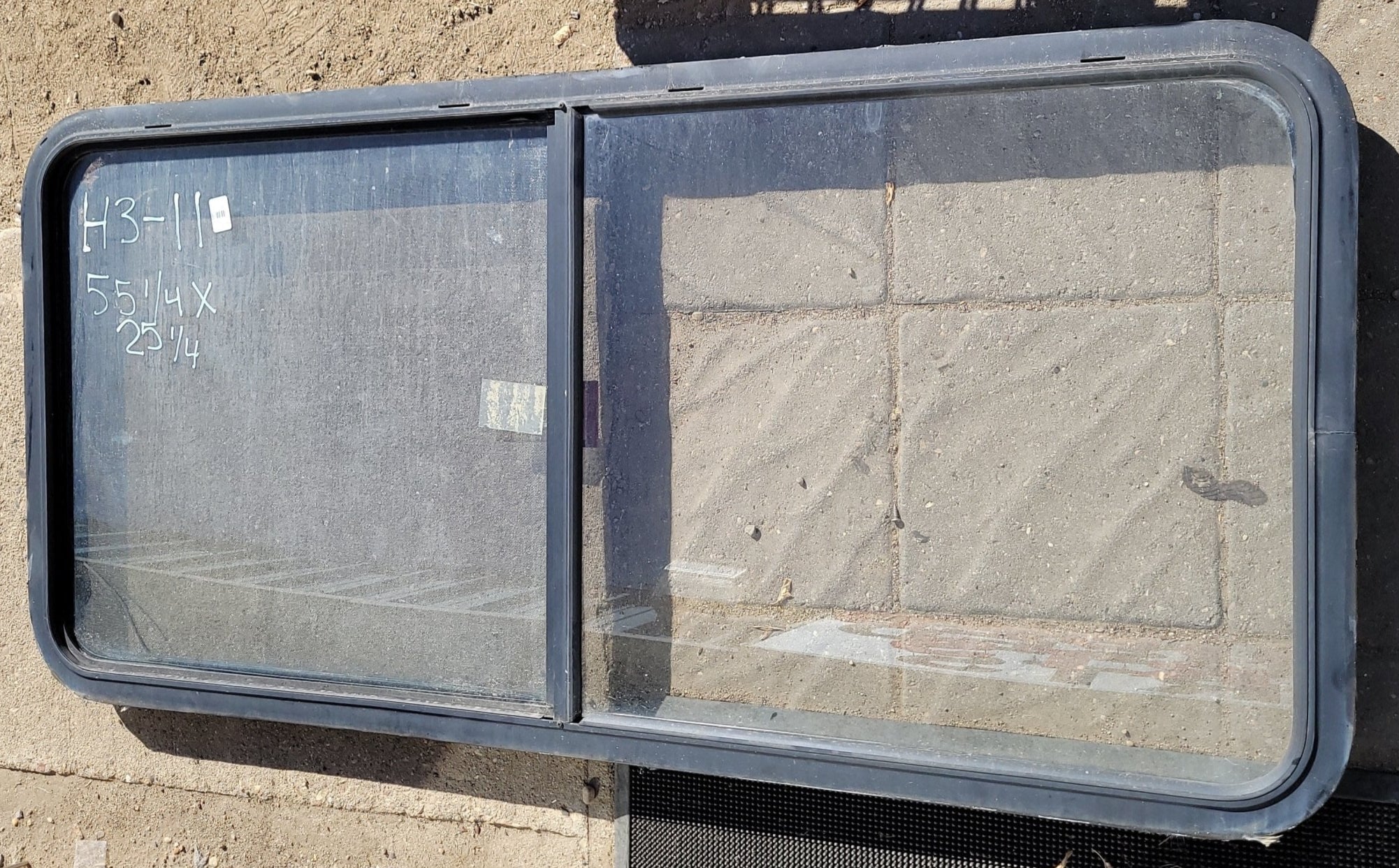 Used Black Radius Emergency Opening Window : 55 1/4 X 25 1/4 X 2" D - Young Farts RV Parts