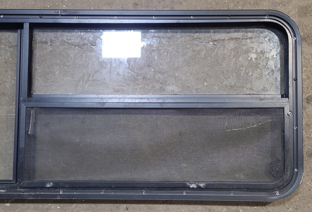 Used Black Radius Emergency Opening Window : 59 1/2" W x 21 1/2" H x 1 7/8" D - Young Farts RV Parts