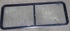 Used Black Radius Emergency Opening Window : 60 1/4" W x 21 3/4" H x 1 7/8" D - Young Farts RV Parts