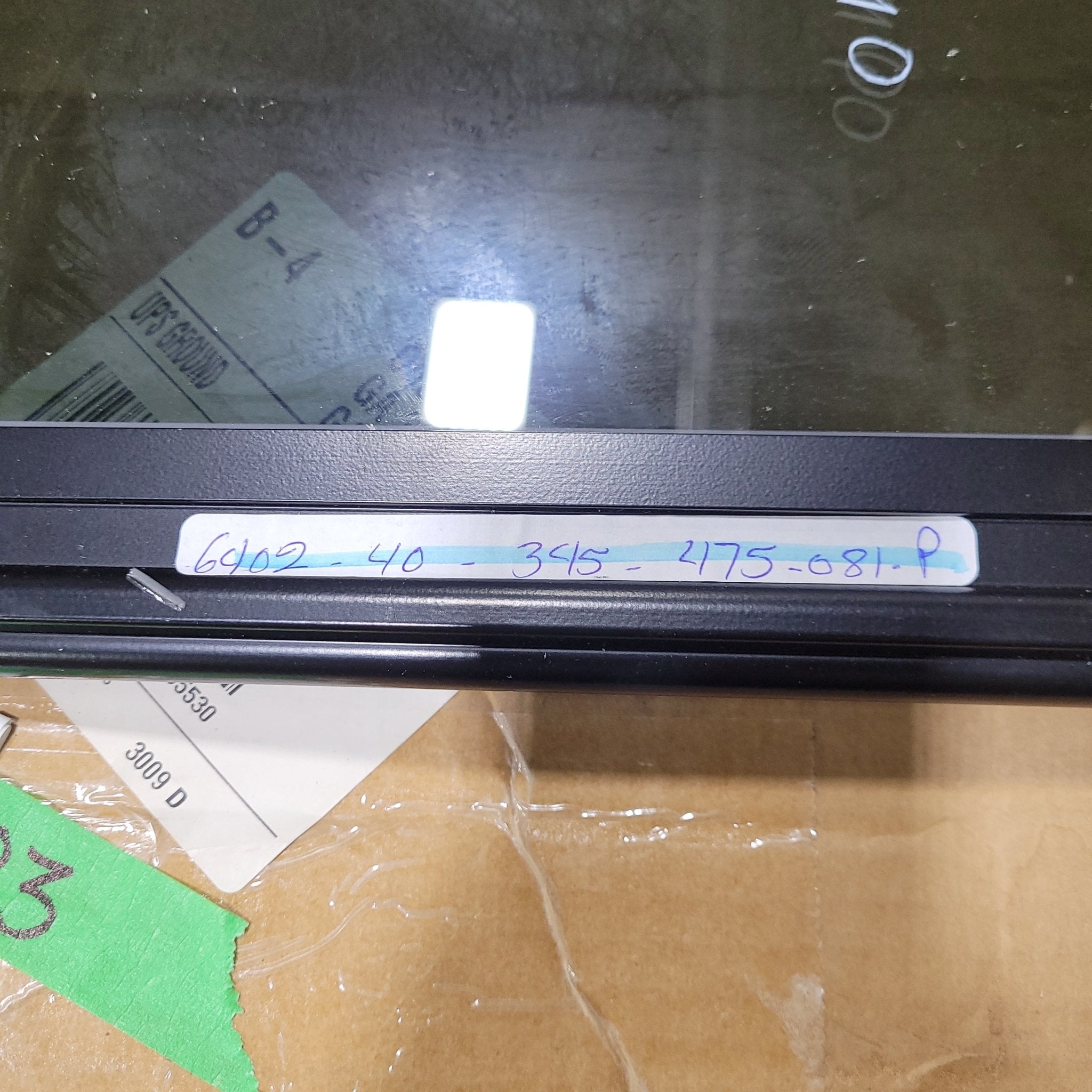 Used Black Radius Frameless Opening Window : 24 1/2" X 10 1/2" X 1/2" D - Young Farts RV Parts