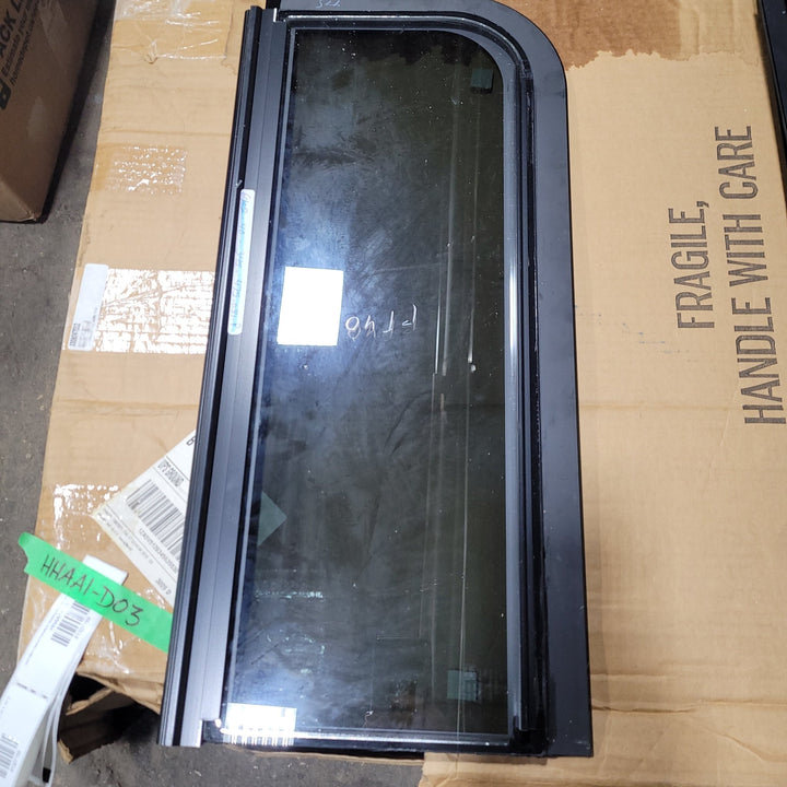 Used Black Radius Frameless Opening Window : 24 1/2" X 10 1/2" X 1/2" D - Young Farts RV Parts