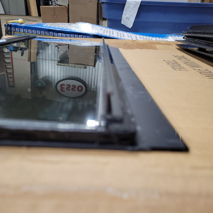 Used Black Radius Frameless Opening Window : 24 1/2" X 10 1/2" X 1/2" D - Young Farts RV Parts