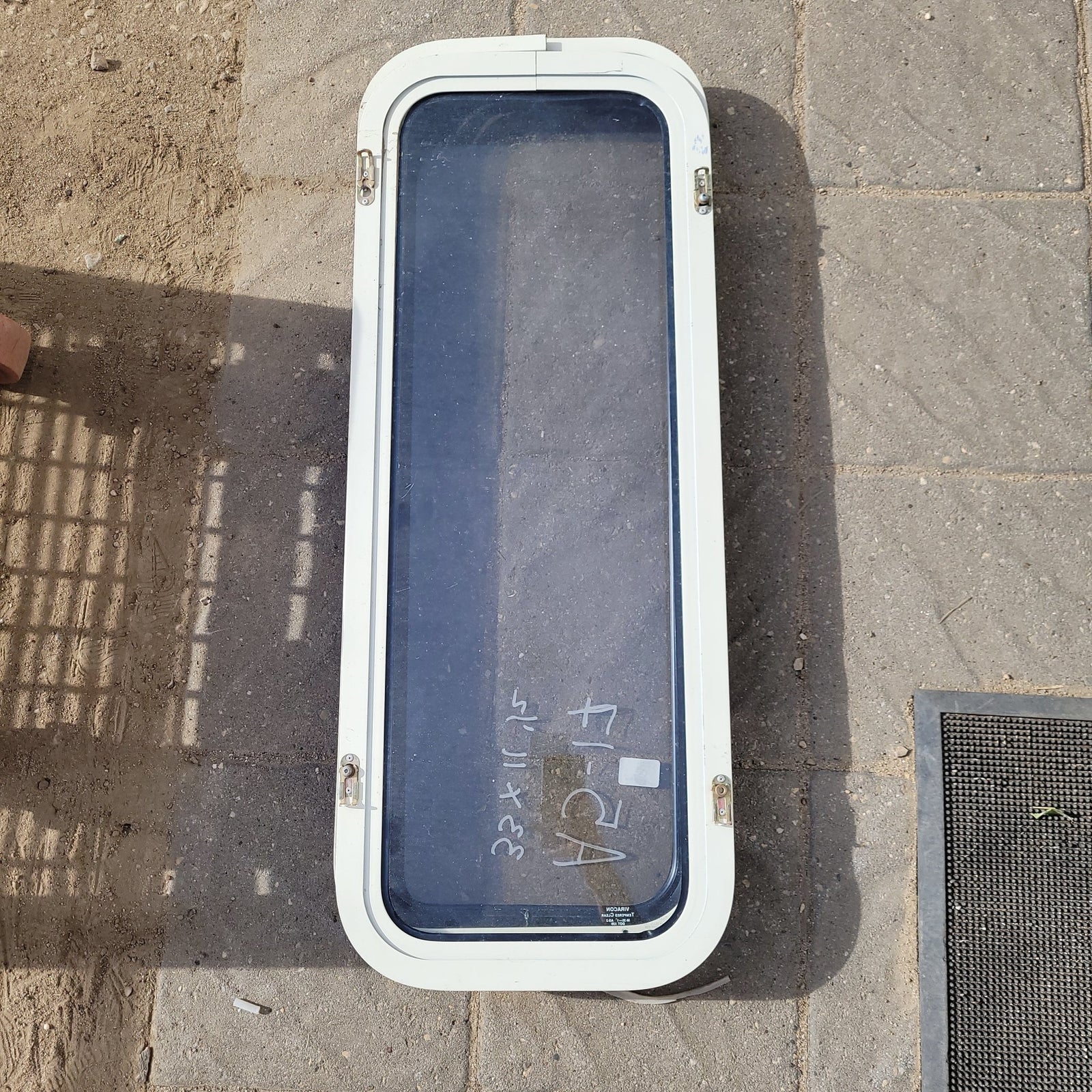 Used Black Radius Non-Opening Window : 33 X 11 1/2 X 2