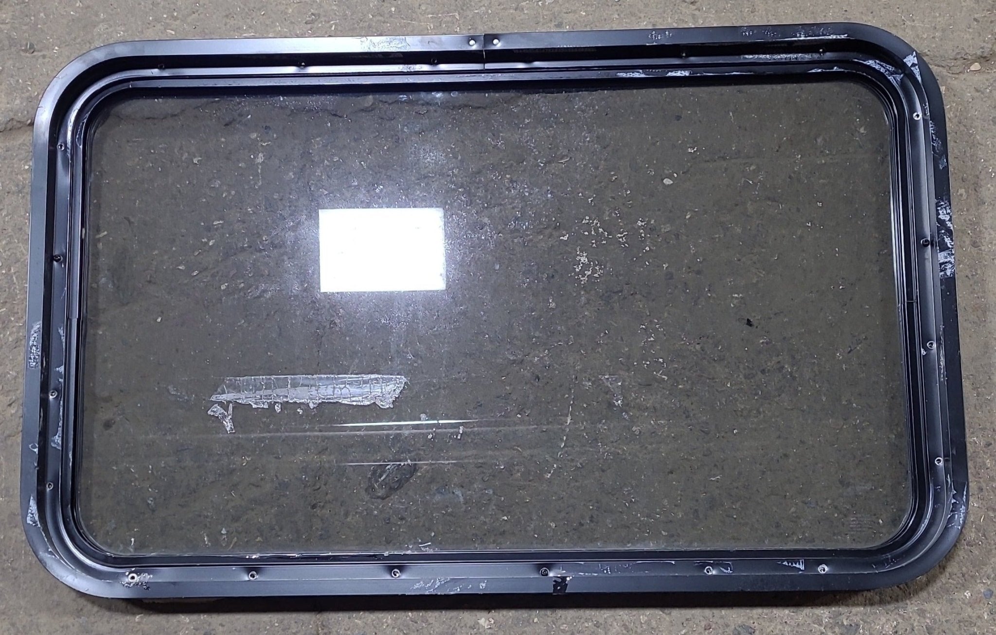 Used Black Radius Non Opening Window : 36 1/4" W x 21 3/4" H x 1 7/8" D - Young Farts RV Parts