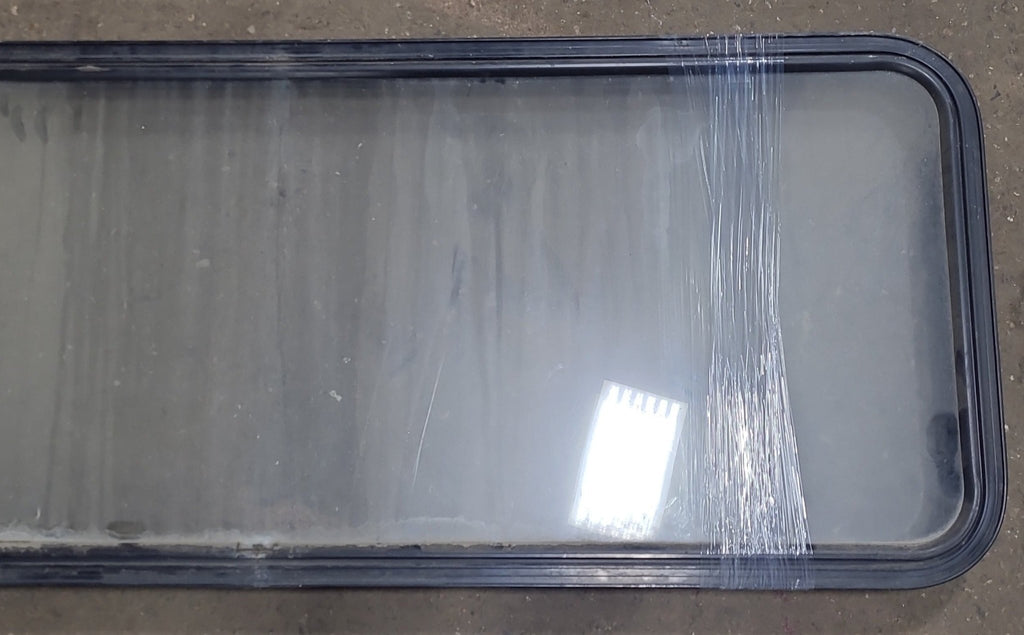 Used Black Radius Non-Opening Window : 59 3/4" W X 21 3/4" H X 2" D - Young Farts RV Parts