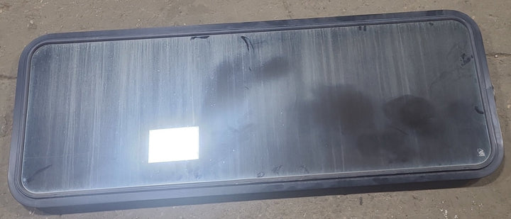 Used Black Radius Non Opening Window : 60 1/2" W x 21 3/4" H x 1 7/8" D - Young Farts RV Parts