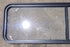 Used Black Radius Non Opening Window : 60 1/4" W x 18" H x 1 3/4" D - Young Farts RV Parts