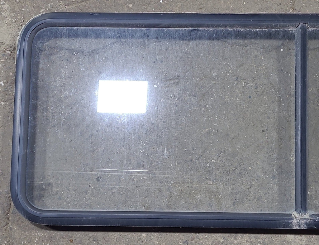 Used Black Radius Non Opening Window : 60 1/4" W x 21 3/4" H x 1 3/4" D - Young Farts RV Parts