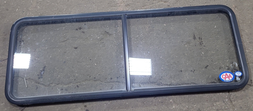 Used Black Radius Non Opening Window : 60 1/4" W x 21 3/4" H x 1 7/8" D - Young Farts RV Parts