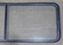 Used Black Radius Non-Opening Window : 60 1/4" W X 21 3/8" H X 1 7/8" D - Young Farts RV Parts