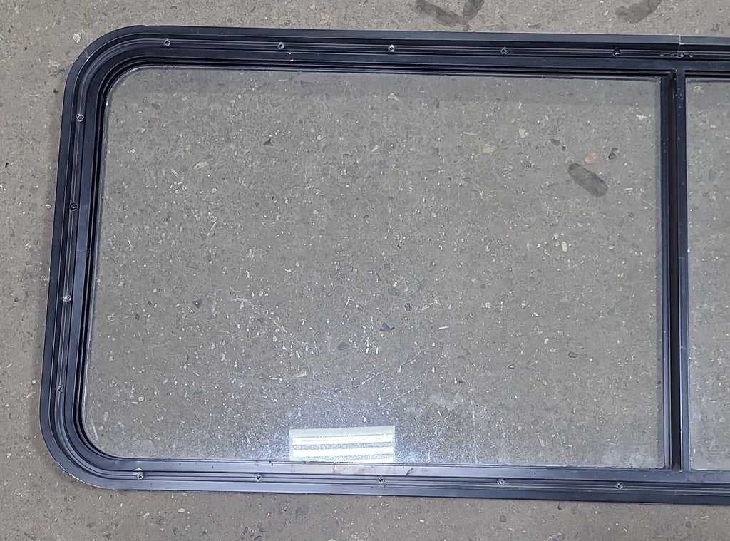 Used Black Radius Non-Opening Window : 60 1/4" W X 21 3/8" H X 1 7/8" D - Young Farts RV Parts