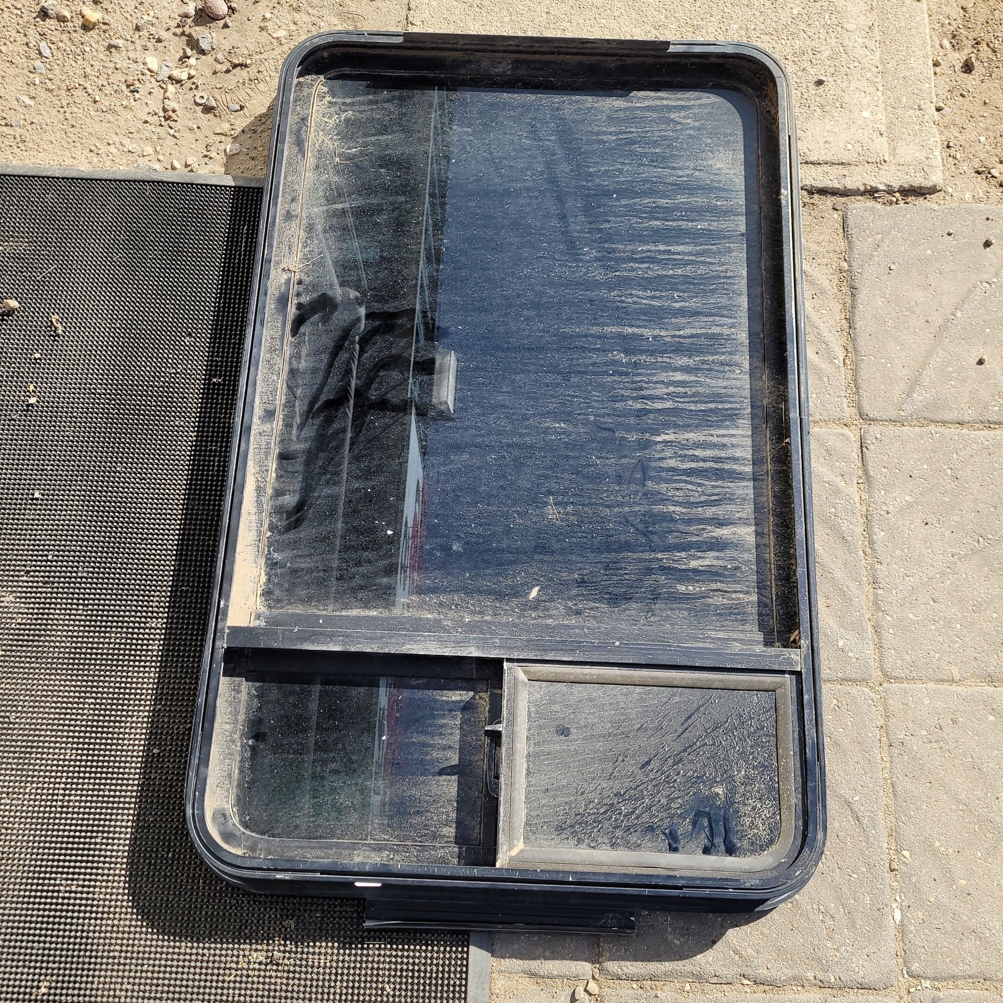 Used Black Radius Opening Storm Window : 39 X 24 1/2 X 2" D - Young Farts RV Parts