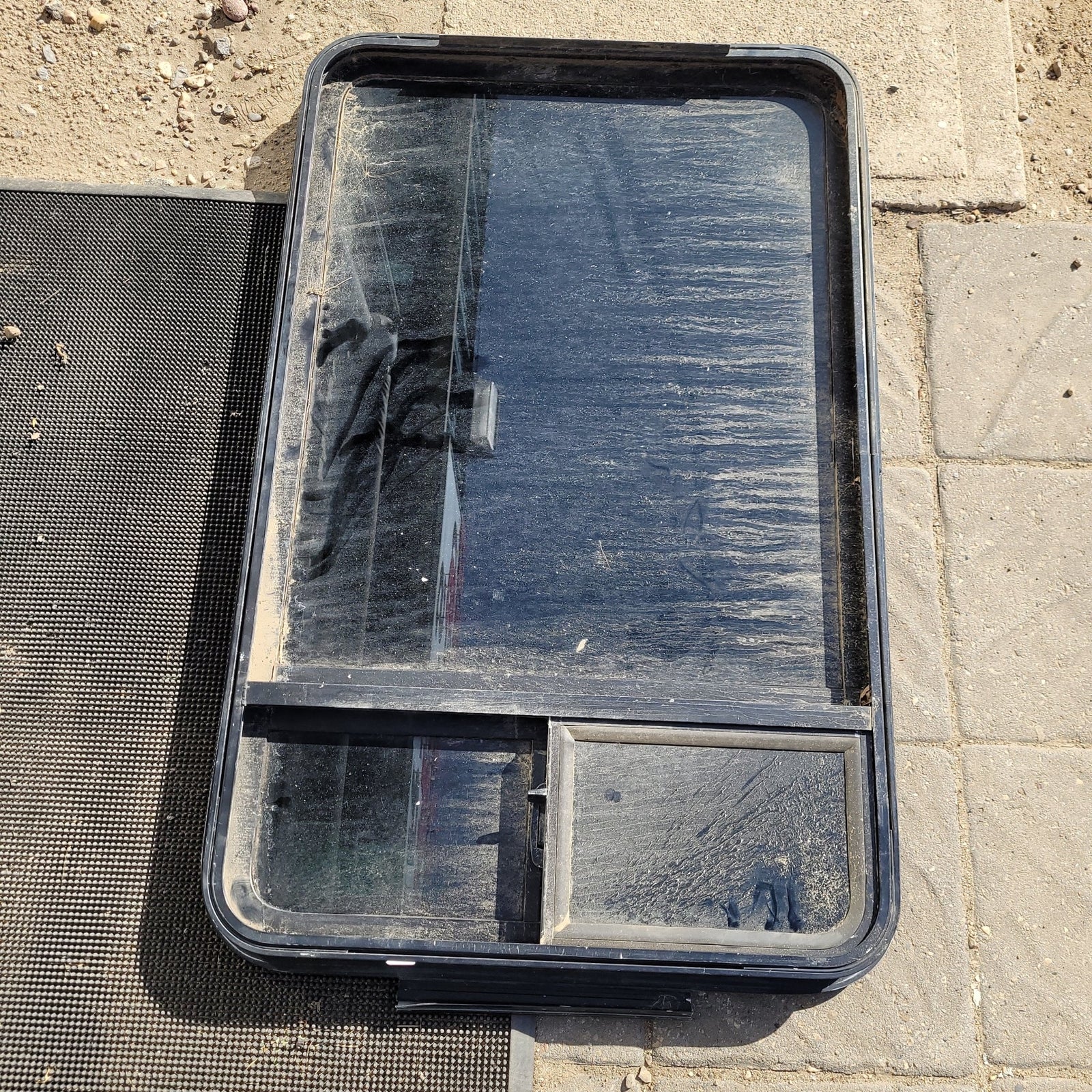 Used Black Radius Opening Storm Window : 39 X 24 1/2 X 2