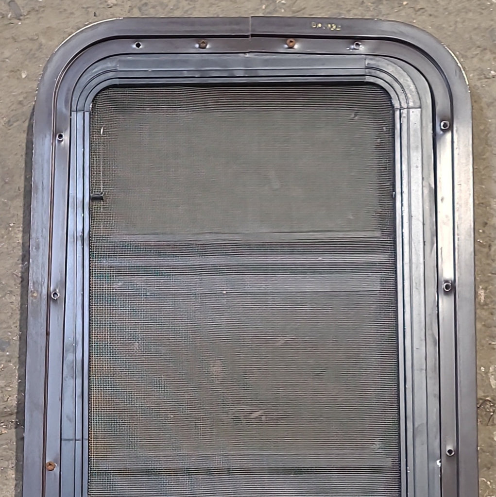 Used Black Radius Opening Window : 13 3/4" W x 29 1/2" H x 2 1/8" D - Young Farts RV Parts
