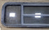 Used Black Radius Opening Window : 15 3/4" H X 61" W X 1 1/2" D - Young Farts RV Parts