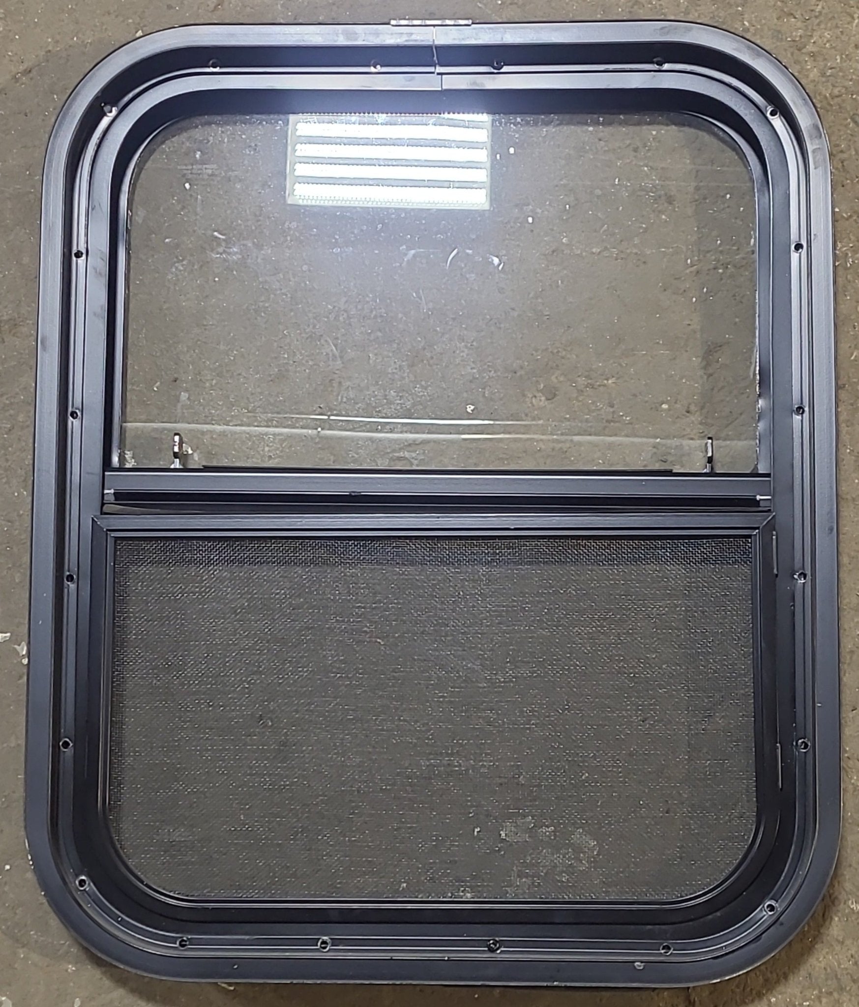 Used Black Radius Opening Window : 17 1/2" W x 21 1/2" H x 1 3/4" D - Young Farts RV Parts