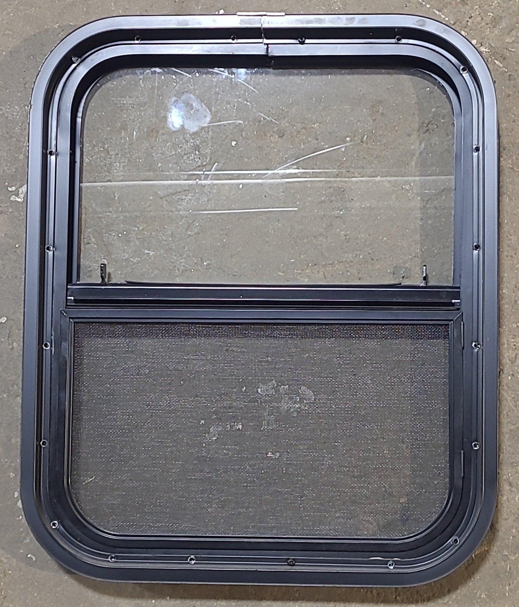 Used Black Radius Opening Window : 17 1/2" W x 21 1/2" H x 1 3/4" D - Young Farts RV Parts