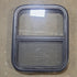 Used Black Radius Opening Window : 17 1/2" W x 21 1/2" H x 1 3/4" D - Young Farts RV Parts