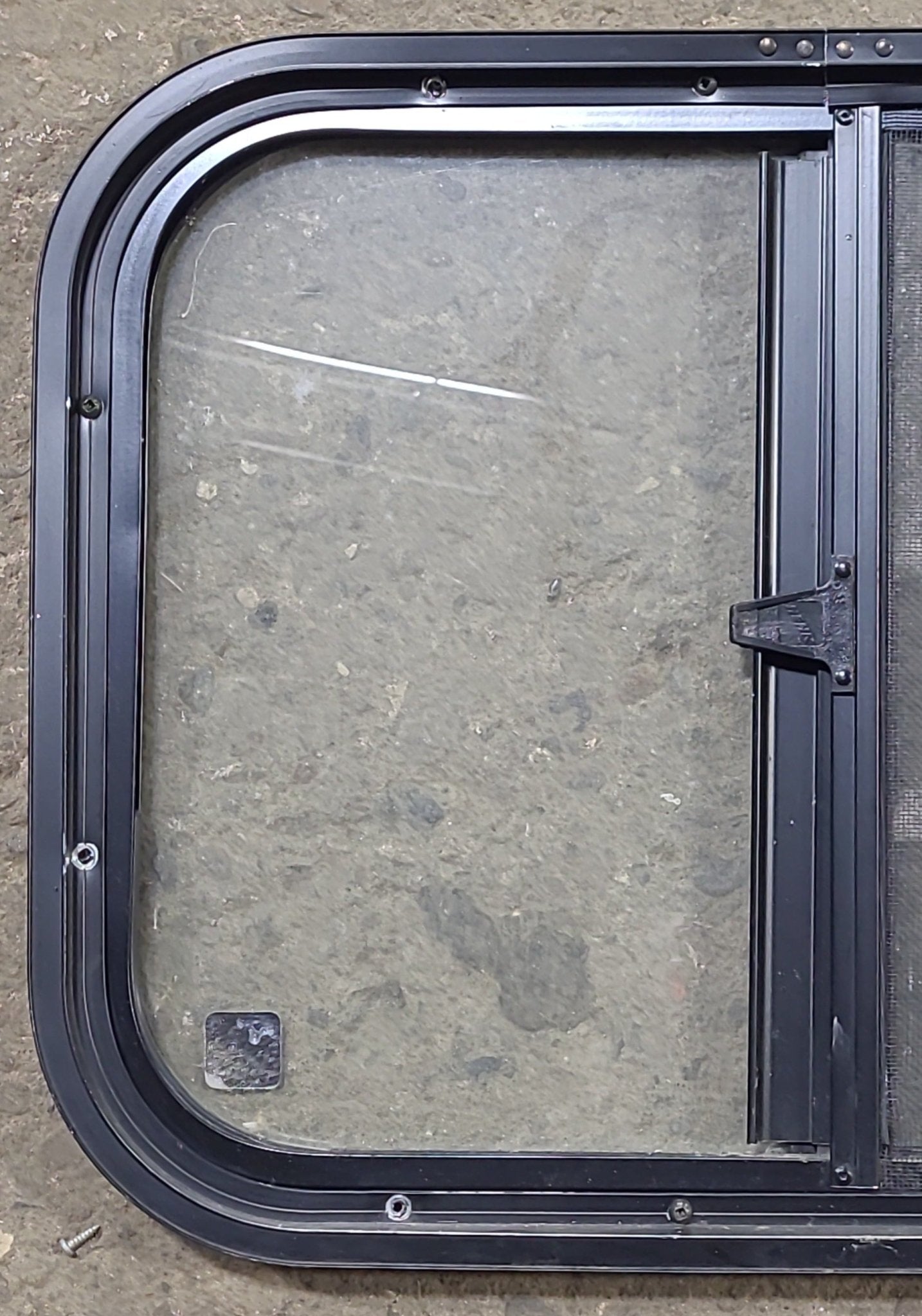 Used Black Radius Opening Window : 19 1/2" W x 14 5/8" H x 1" D - Young Farts RV Parts