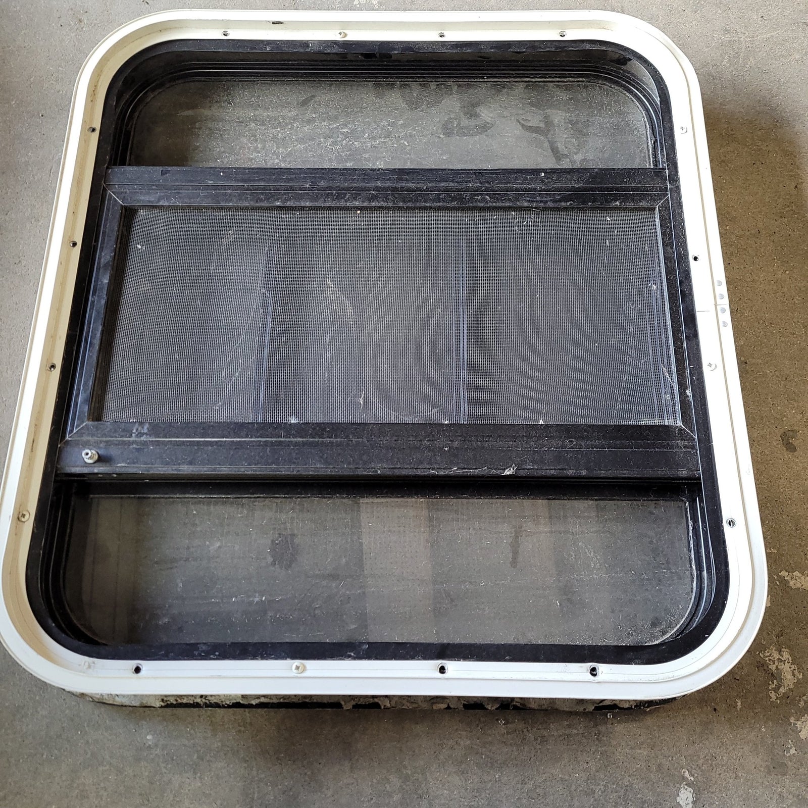 Used Black Radius Opening Window : 22 X 23 1/2 X 2