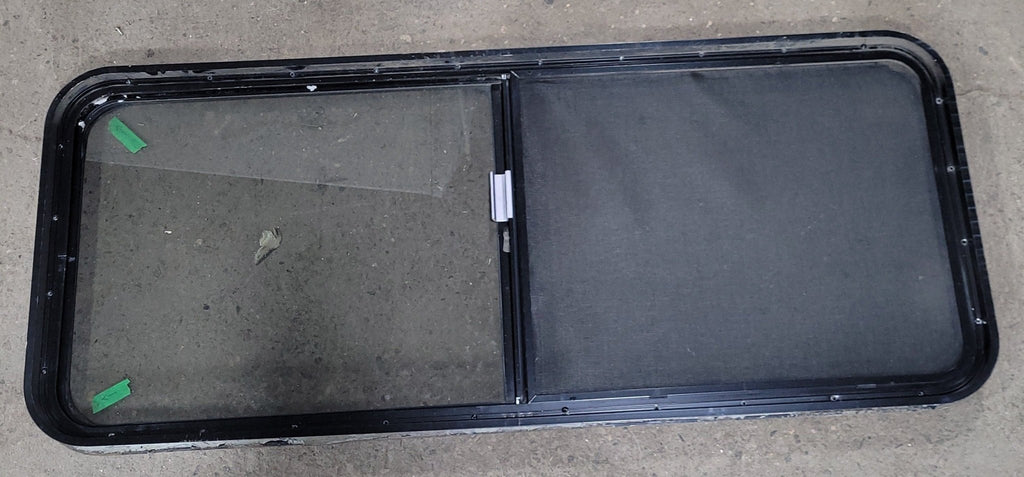 Used Black Radius Opening Window : 22" X 54 1/2" X 2" D - Young Farts RV Parts