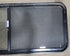 Used Black Radius Opening Window : 22" X 54 1/2" X 2" D - Young Farts RV Parts