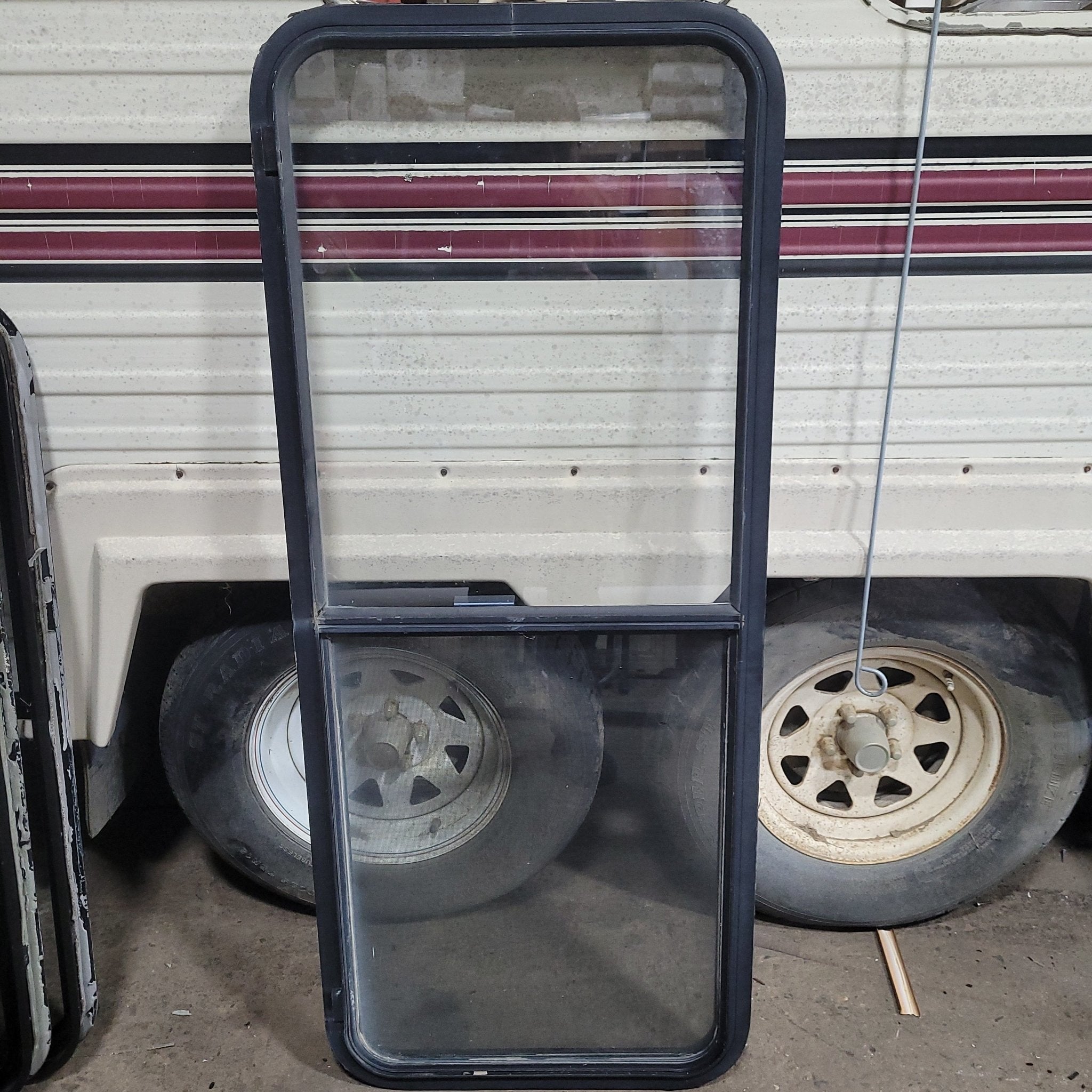 Used Black Radius Opening Window : 22 X 54 3/4 X 2" D - Young Farts RV Parts