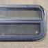 Used Black Radius Opening Window : 23 1/2" W x 14 1/2" H x 1 3/4" D - Young Farts RV Parts