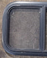 Used Black Radius Opening Window : 23 1/2" W x 14 1/2" H x 1 3/4" D - Young Farts RV Parts