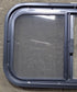 Used Black Radius Opening Window : 23 1/2" W x 14 1/2" H x 1 7/8" D - Young Farts RV Parts