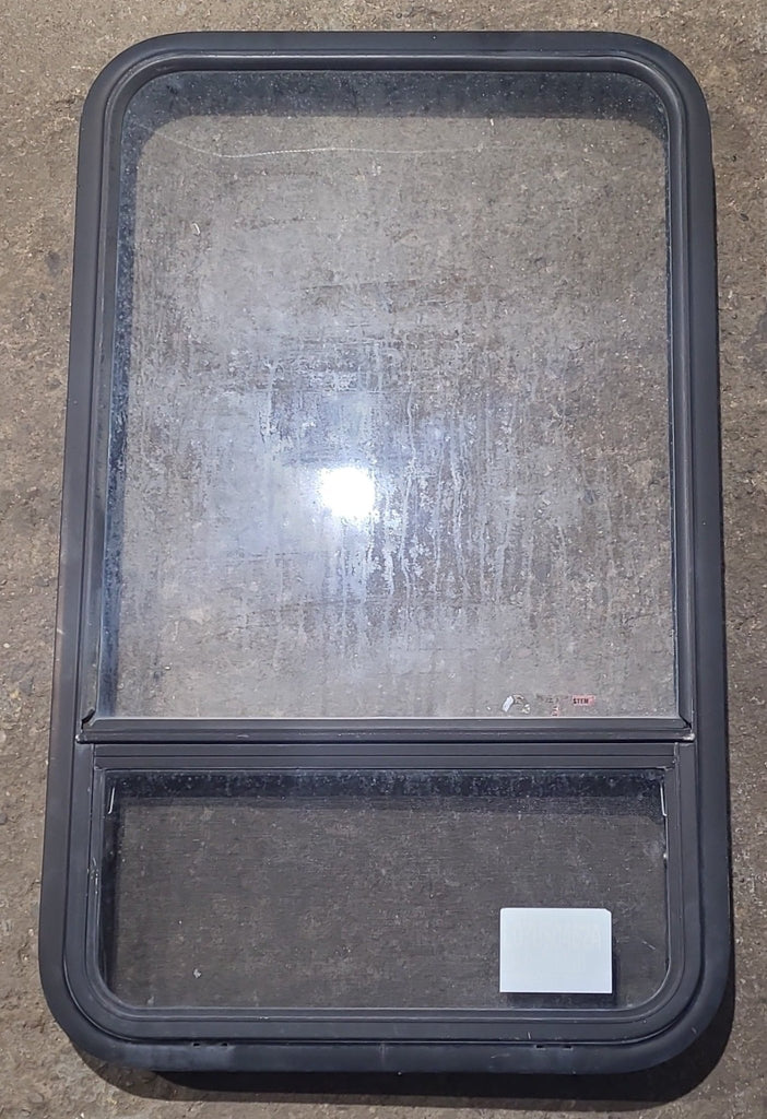 Used Black Radius Opening Window : 23 1/2" W x 39 1/4" H x 1 7/8" D - Young Farts RV Parts